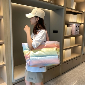 Quilted rainbow puffer tote bag showing large capacity and soft down cotton material