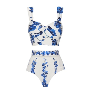 Detail view of floral print high waist bikini set with twisted bandeau top for beach vacation