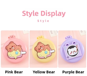 Three colors of portable folding hairbrushes with cute 3D bear designs and mirrors