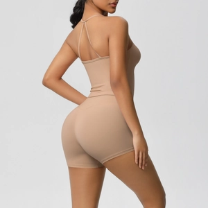 Detailed back view of a nude racerback sports tank top with cross straps and high waist