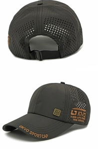 Close-up of black breathable baseball cap with laser-cut holes and detailed embroidery
