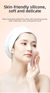 Pink silicone facial brush used on face for deep cleansing and gentle exfoliating