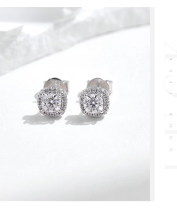 Macro shot of S925 sterling silver stamp and square-cut moissanite halo stud earrings
