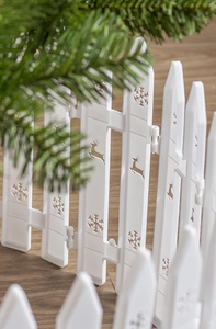 White Christmas picket fence with reindeer and snowflake hollow patterns on wood