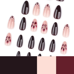 3D almond press-on nails featuring dark brown finish and floral art with gold accents