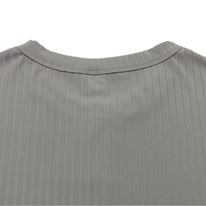 Close-up of grey ribbed knit texture and V-neck stitching on men's fitted shirt