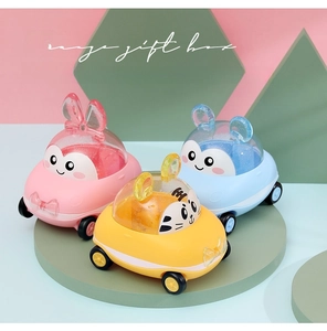 Detailed view of colorful cartoon animal gift boxes with glitter domes and ribbon accents