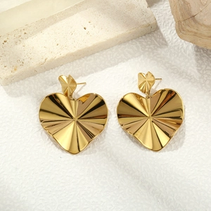 Elegant gold vintage heart-shaped stud earrings with unique pleated radial metal texture