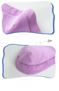 Detail of purple knitted cotton socks featuring reinforced heel and seamless toe design