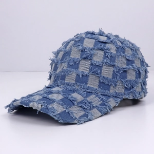 Distressed blue checkered denim baseball cap with frayed edges for street style fashion