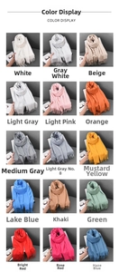 Detailed grid showing fifteen assorted solid colors of soft scarves with fringe tassels