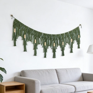 Handmade dark green bohemian wall tapestry with cotton fringe and natural wood beads