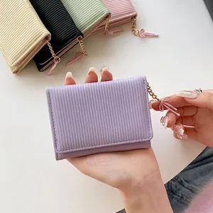 Short tri-fold corduroy wallet for women featuring a bow pendant and chain in five colors