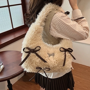 Fuzzy cream shoulder bag with brown leather bows and silver butterfly charm for women