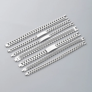 Detailed collection of seven polished silver stainless steel men watch chain bracelets