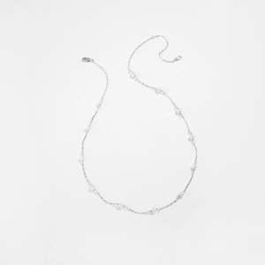 Detail of S925 sterling silver chain necklace with elegant white pearls and lobster clasp
