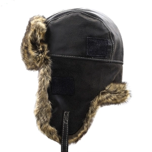 Winter faux leather trapper hat with warm brown faux fur lining and earflaps