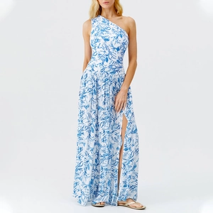 Detail of one-shoulder floral dress with blue tropical print and high side slit design