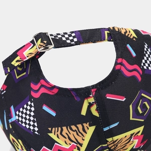 Detailed view of the adjustable metal buckle and retro graffiti print on the baseball cap