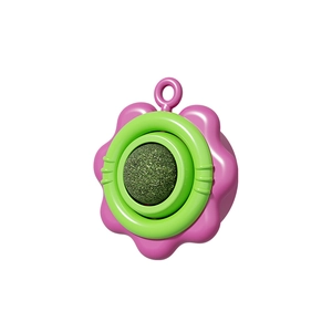 Wall-mounted catnip ball toy with flower-shaped base and rotating green catnip sphere
