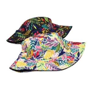 Set of black and white leaf print reversible bucket hats for sun protection