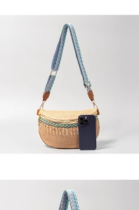 Detail of bohemian straw chest bag with colorful bead tassels and woven strap