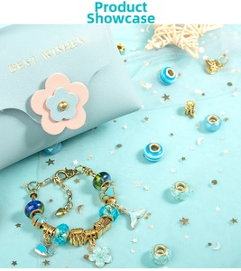 Detail of ocean-themed DIY bracelet kit with blue beads and a faux leather jewelry bag