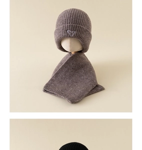 Detail of baby knit hat and scarf set in dark coffee with heart embroidery