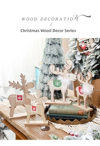 Macro view of wooden Christmas reindeer figurines with snowflake patterns and fuzzy collars