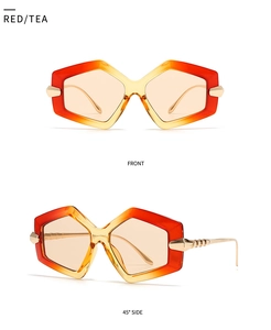 Detail views of oversized hexagonal sunglasses with red-tea gradient and golden metal temples
