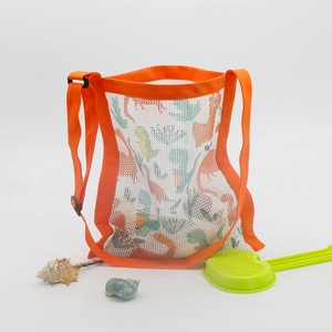 Kids printed mesh beach shell bag with orange straps and dinosaur motifs on white background