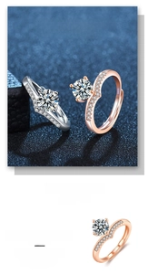 Macro shot of V-shaped silver and rose gold S925 rings with micro-pave crystals