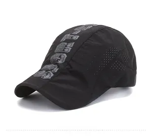 Detail of breathable mesh fabric on black sports cap with grey SPORT lettering