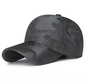Detail of sport camouflage baseball cap with 3D embroidery and breathable mesh texture