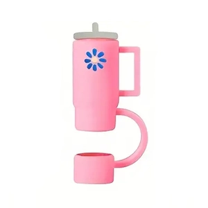 Detailed view of pink silicone handle and decorative blue floral straw cover accessory