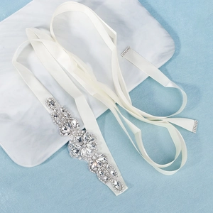 Ivory satin bridal belt with sparkling silver rhinestone floral applique for weddings