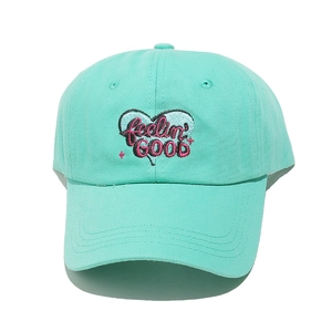 Close-up of mint green baseball cap with heart embroidery and feelin' GOOD text