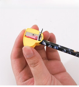 Detail of yellow heart-shaped pencil sharpener used on a nail art rhinestone picker pen