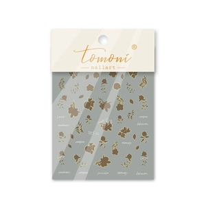 Detail of MS-82 gold flower nail art stickers with elegant floral patterns and cursive text