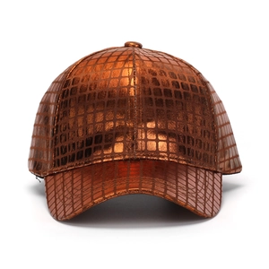 Front view of metallic bronze baseball cap with textured square scale pattern