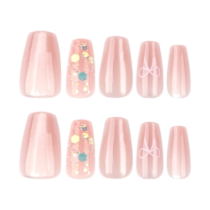 Short coffin press-on nails in glitter nude cat-eye pink with bow designs