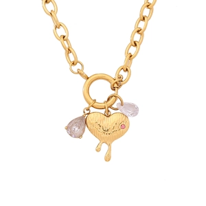 Gold chain necklace with molten heart pendant and transparent teardrop gemstones
