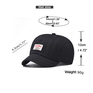 Detail view of adjustable black short brim cotton baseball cap with vintage patch