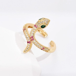 Macro shot of 18K gold-plated snake ring featuring micro-pave white and red zircon