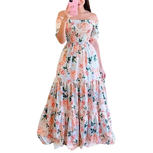 Off-shoulder floral maxi dress with elastic bandeau and tiered ruffle hem in white and orange