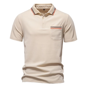 Detailed view of beige men's polo shirt with striped collar and chest pocket