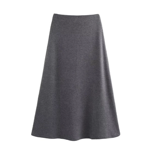 Detailed close-up of dark grey knitted A-line midi skirt with premium fabric texture
