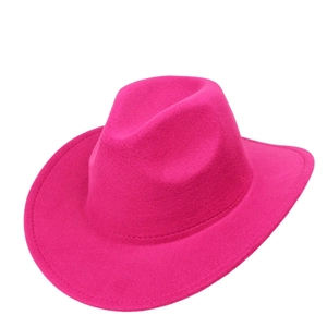 Detail of rose red wool felt cowboy hat showing wide brim stitching and premium texture