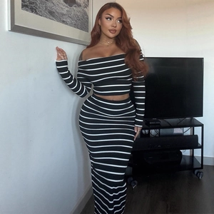 Slim fit black and white striped off-shoulder crop top and bodycon skirt set
