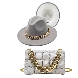 Matching set of grey wool fedora hat and quilted cloud bag with gold chunky chains